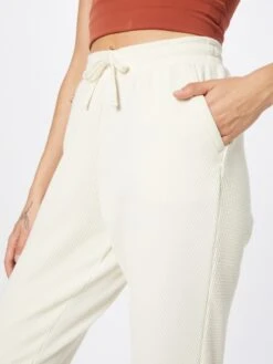 Nike Trainingsbroeken Tapered Sportbroek Dames Wolwit -Sportieve Outfit Winkel 1a4ccf444dc4c84b6bf0112c2b23e269