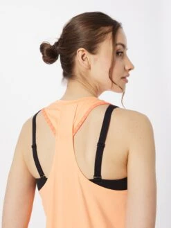 Under Armour Sporttops Sporttop Knockout Novelty Dames Lichtoranje 11 Under Armour Sporttops Sporttop Knockout Novelty Dames Lichtoranje -Sportieve Outfit Winkel 28254ff0de3991939e6b8b45509da363