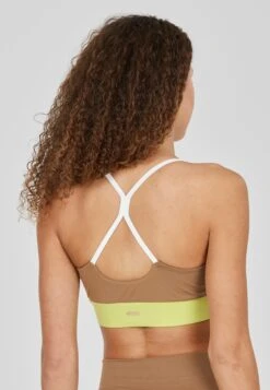 ATHLECIA Medium Support Bustier Sport Bh Sukey Dames Geel / Wit 11 ATHLECIA Medium Support Bustier Sport Bh Sukey Dames Geel / Wit -Sportieve Outfit Winkel 61a40ef4115600d4834bdea0c430e67d