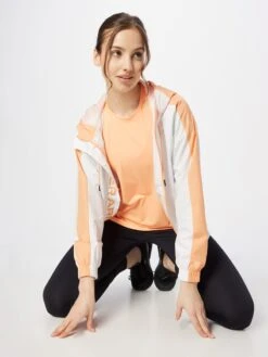 Under Armour Sporttops Sporttop Knockout Novelty Dames Lichtoranje 10 Under Armour Sporttops Sporttop Knockout Novelty Dames Lichtoranje -Sportieve Outfit Winkel d094ac7bb21a6f74cfa174934b747046